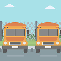 Image showing Yellow buses on the background of mesh fence.