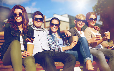 Image showing group of students or teenagers drinking coffee