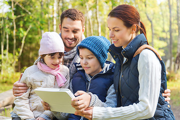 Image showing happy family with tablet pc at camp