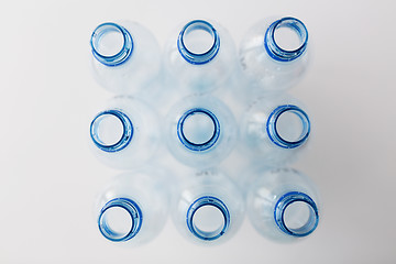 Image showing close up of empty used plastic bottles on table