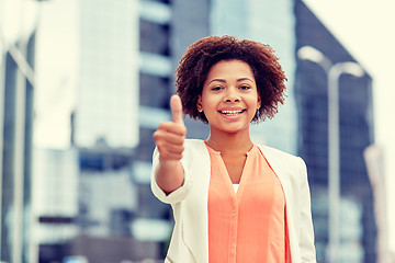 Image showing happy young african american businesswoman in city