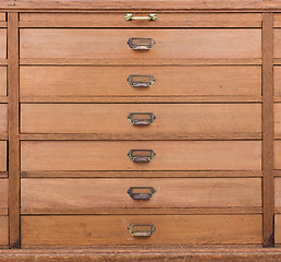 Image showing Row of large drawers with empty tags