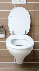 Image showing White toilet bowl in the bathroom