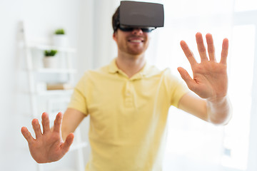 Image showing young man in virtual reality headset or 3d glasses