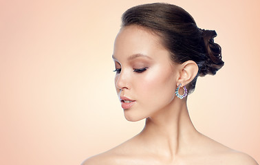 Image showing close up of beautiful woman face with earring