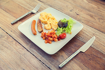 Image showing plate of different food on table