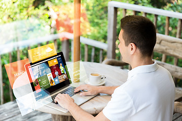 Image showing close up of businessman with laptop on terrace