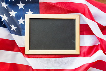 Image showing close up of school blackboard on american flag