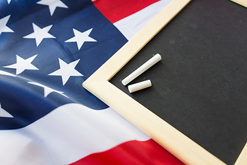 Image showing close up of school blackboard on american flag