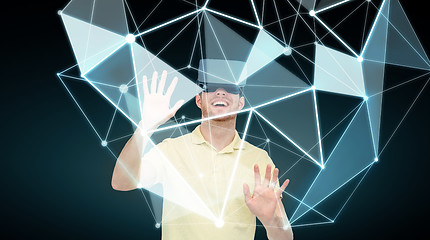 Image showing happy man in virtual reality headset or 3d glasses