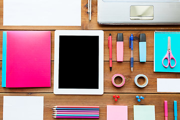 Image showing close up of school supplies and tablet pc