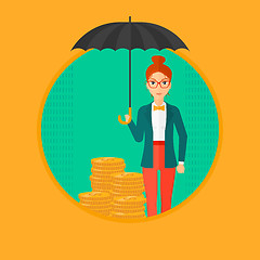 Image showing Woman with umbrella protecting money.