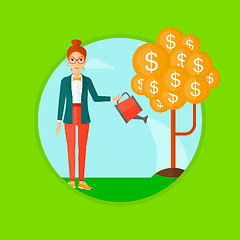 Image showing Woman watering money tree.