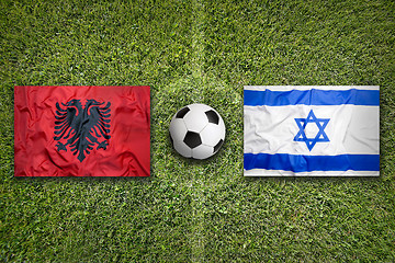 Image showing Albania vs. Israel flags on soccer field