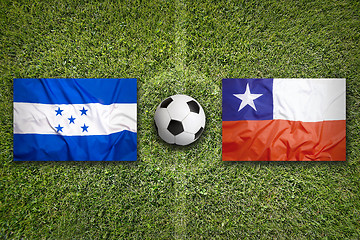 Image showing Honduras vs. Chile flags on soccer field