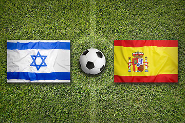 Image showing Israel vs. Spain flags on soccer field