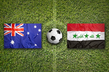 Image showing Australia vs. Iraq flags on soccer field