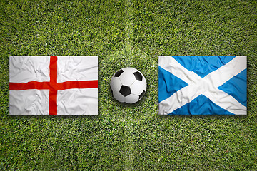 Image showing England vs. Scotland flags on soccer field