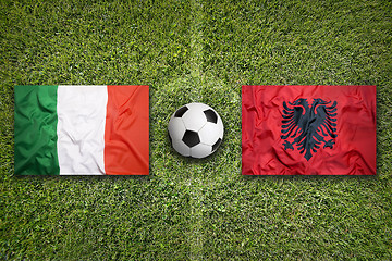 Image showing Italy vs. Albania flags on soccer field
