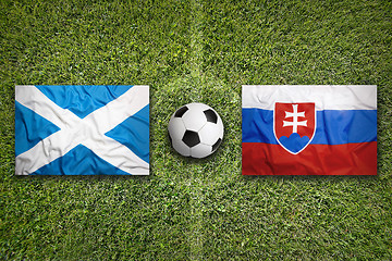 Image showing Scotland vs. Slovakia flags on soccer field