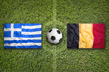 Image showing Greece vs. Belgium flags on soccer field