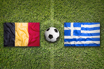 Image showing Belgium vs. Greece flags on soccer field