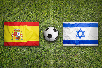 Image showing Spain vs. Israel flags on soccer field