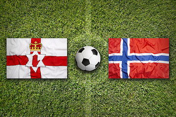 Image showing Northern Ireland vs. Norway flags on soccer field