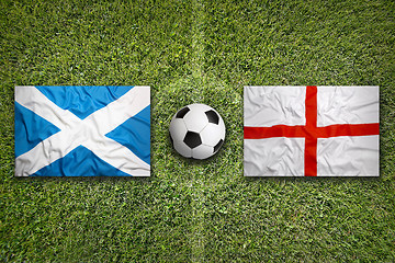 Image showing Scotland vs. England flags on soccer field