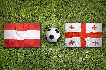 Image showing Austria vs. Georgia flags on soccer field