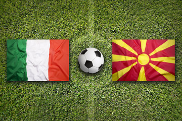 Image showing Italy vs. Macedonia flags on soccer field