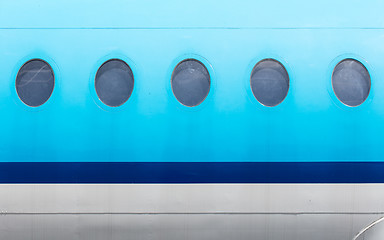 Image showing Windows of the blue airplane