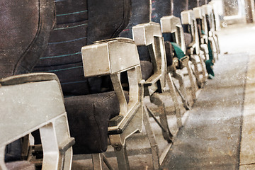 Image showing Empty old airplane seats in the cabin, selective focus, vintage 