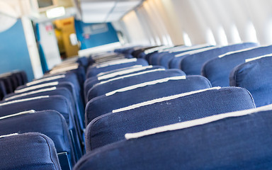 Image showing Empty old airplane seats in the cabin, selective focus