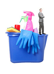 Image showing Businessman with cleaning products