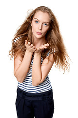 Image showing Woman blowing a kiss at camera