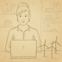 Image showing Woman working at laptop. 