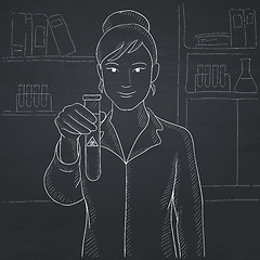 Image showing Laboratory assistant with test tube.