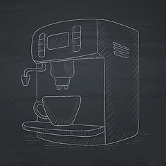 Image showing Coffee maker with cup.