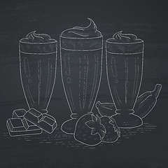 Image showing Banana, strawberry and chocolate smoothies.
