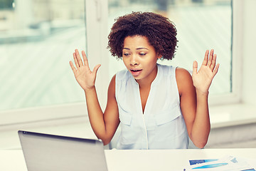 Image showing african woman with laptop at office