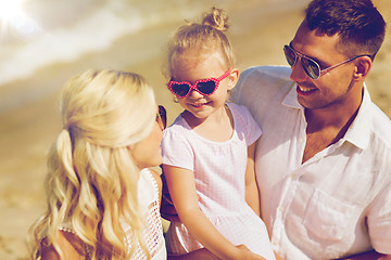 Image showing happy family in sunglasses on summer beach