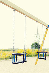 Image showing baby swing on playground outdoors