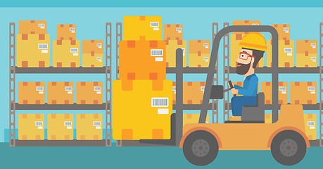 Image showing Warehouse worker moving load by forklift truck.