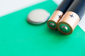 Image showing close up of green alkaline batteries