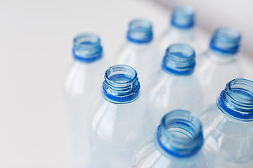 Image showing close up of empty used plastic bottles on table