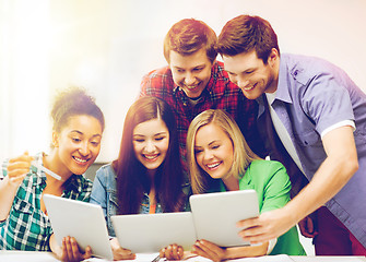 Image showing students looking at tablet pc in lecture at school