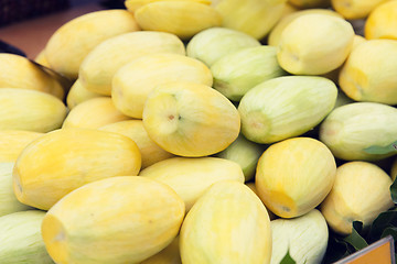 Image showing peeled mango at street market