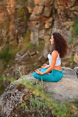 Image showing Young woman is practicing yoga