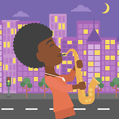 Image showing Woman playing saxophone.